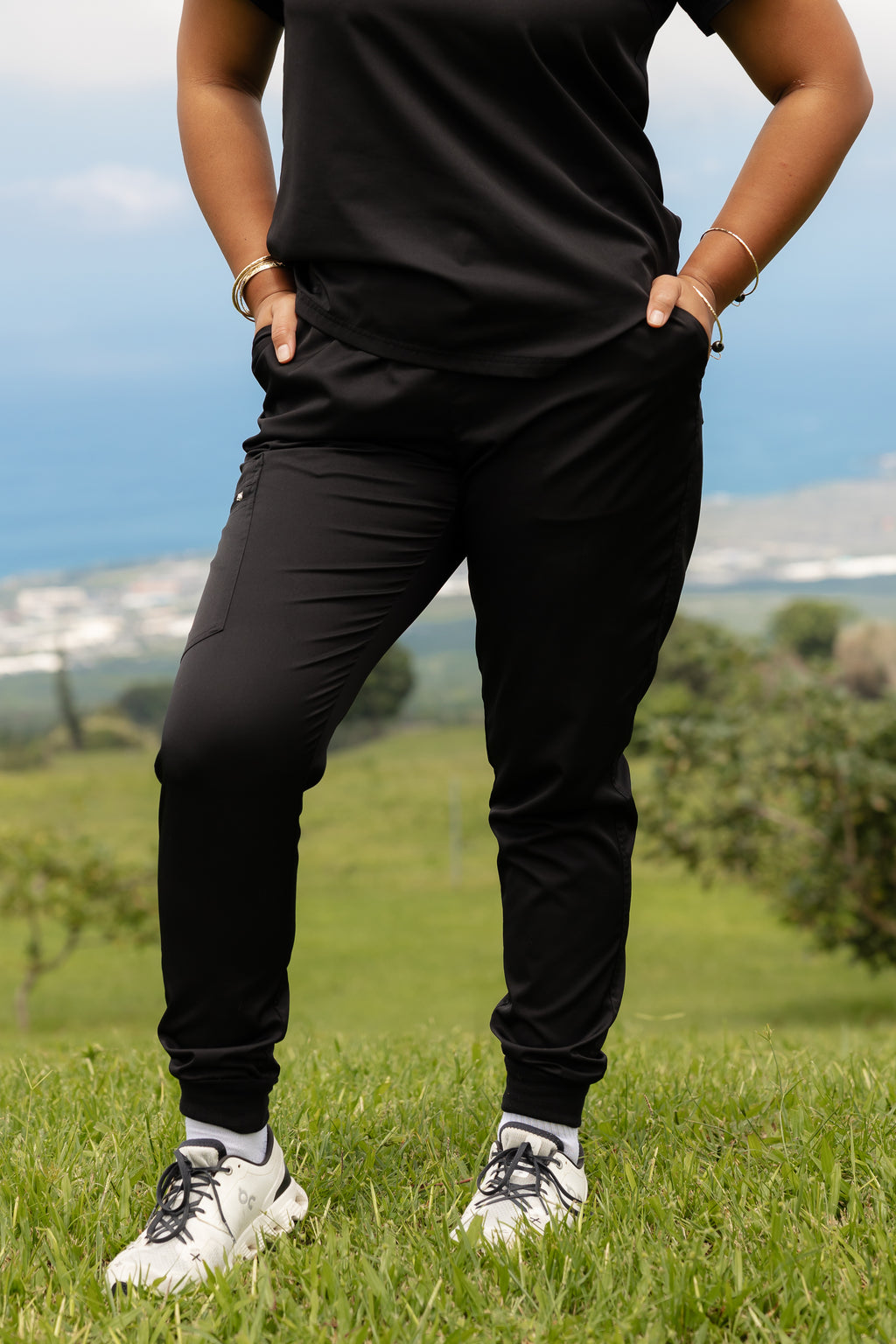 Women’s black jogger scrub pants with multiple pockets